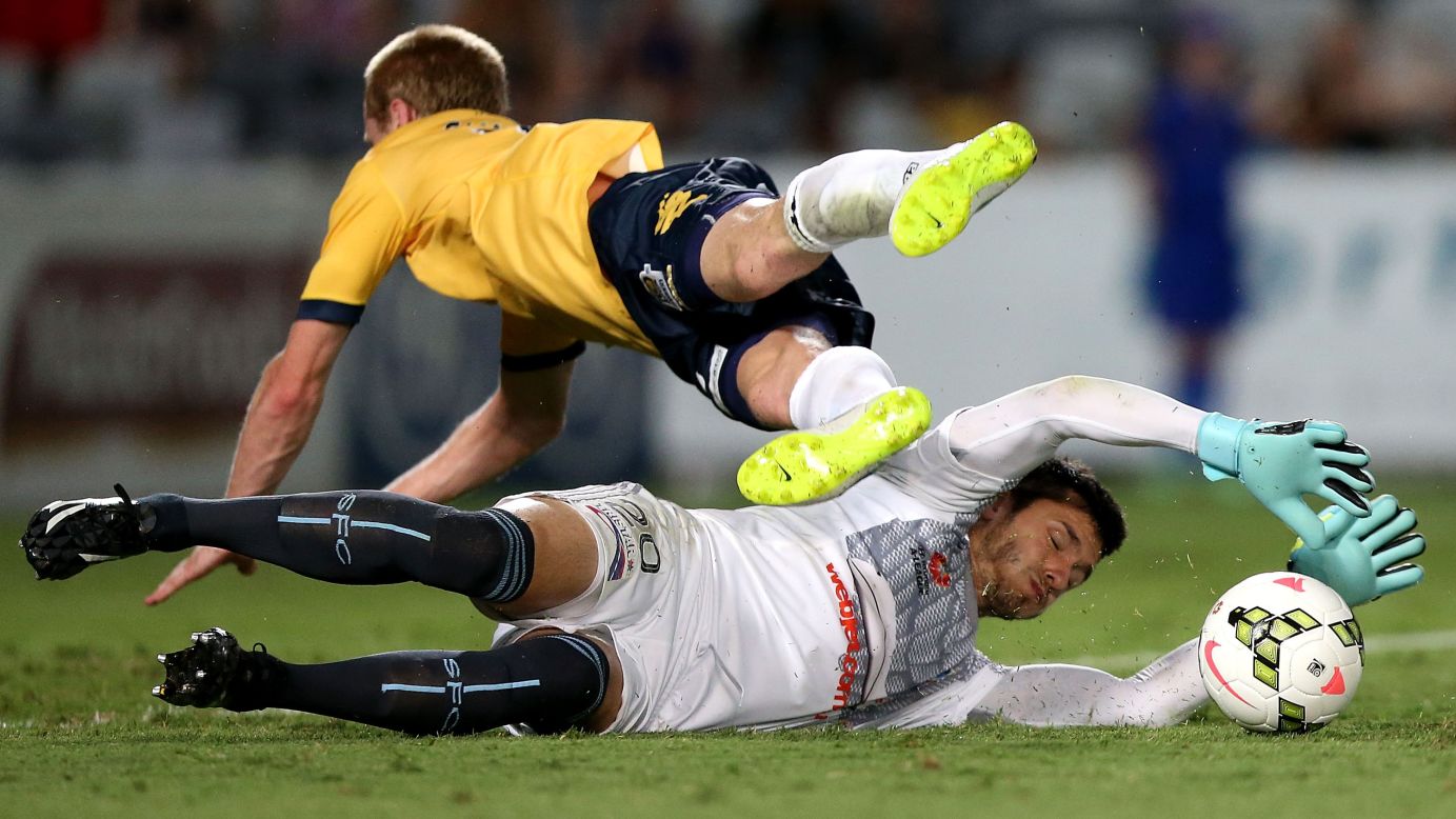 Sydney FC goalkeeper Vedran Janjetovic makes a save on Matthew Simon of the Central Coast Mariners during an A-League match in Gosford, Australia, on Saturday, January 24. Sydney FC won the match 5-1. <a href="http://www.cnn.com/2015/01/20/sport/gallery/what-a-shot-0120/index.html" target="_blank">See 33 amazing sports photos from last week</a>