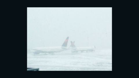 Flight attendant Lia Ocampo told CNN's iReport she was getting ready for her first blizzard at JFK International Airport.