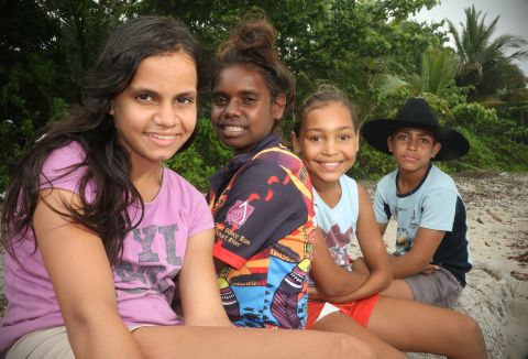 Kuku Yalanji children from Mossman, in north Queensland, spend time at Newell Beach with elders from the Kuku Bama language project.