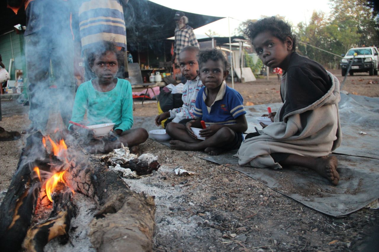 Wik children gather around the campfire at Bull Yard outstation on Wik homelands, on the Cape York Peninsula in north Queensland. This, and the other images in this gallery, were taken by photographer Leigh Harris from <a href="http://ingeousstudios.com/" target="_blank" target="_blank">Ingeous Studios.</a>