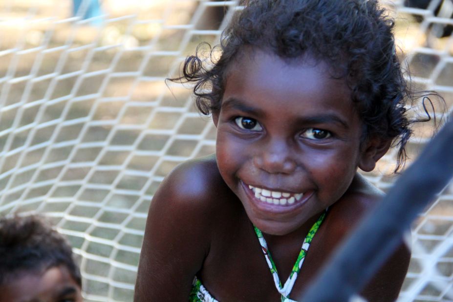 A young girl from Aurukun in Far North Queensland smiles. A campaign is under way to include Aboriginal and Torres Strait Islanders in Australia's constitution. A nationwide referendum is expected to be held in 2017.