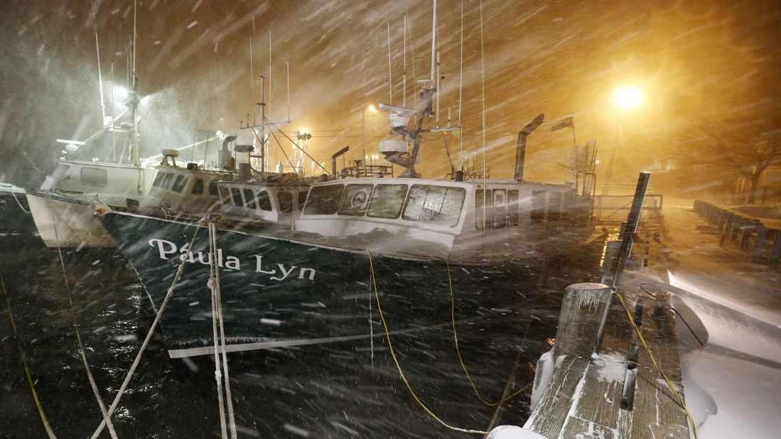 Fishing boats ride out the storm at a dock in Scituate on January 27.