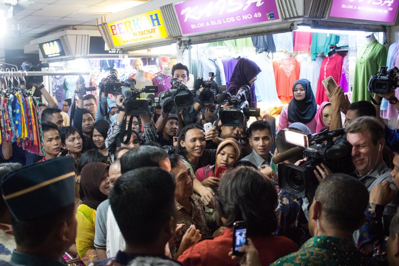 In southeast Asia's largest garment market, narrow hallways lined with stalls became impassable as seemingly everyone in the florescent-lit building poured in for a chance to see "Jokowi."<br /><br />He stopped to buy 20 sarongs -- for gifts in the office, he says -- from a salesman, who struggled to contain his giddy excitement.