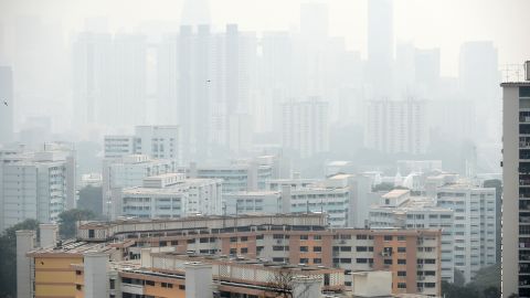 Singapore's financial business district covered with smog, on September 15, 2014. Offcials said air pollution hit unhealthy levels due to smog from fires raging across rainforests in Indonesia's neigboring Sumatara island.
