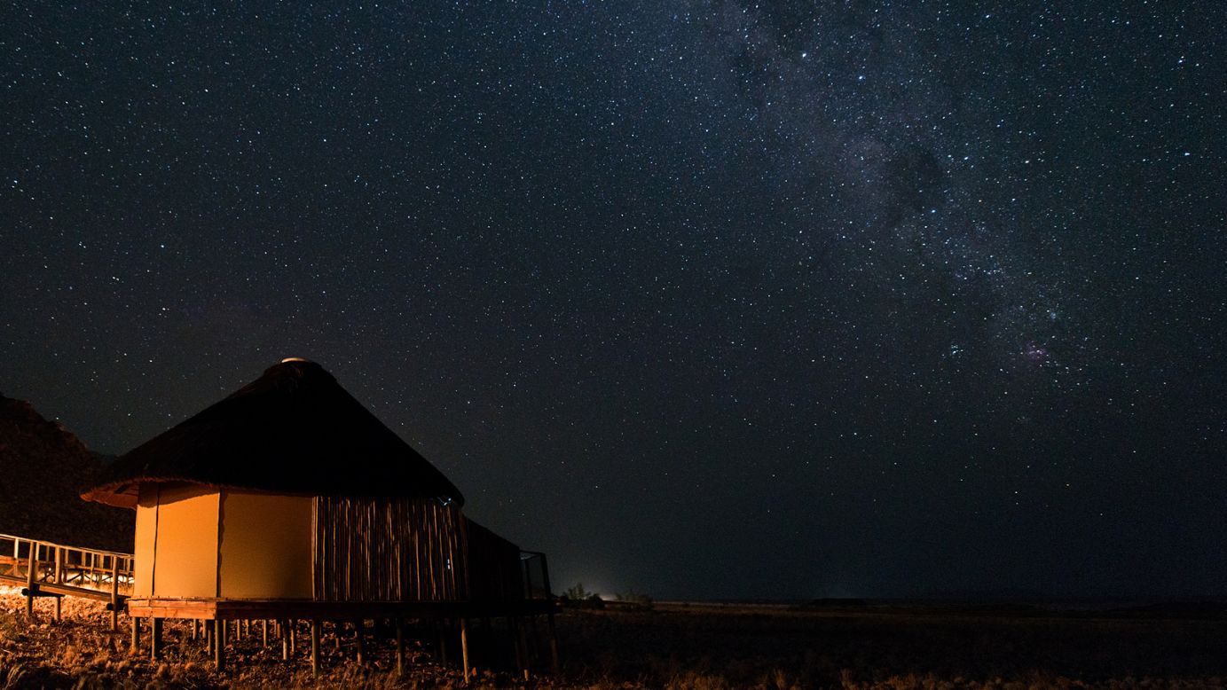 With an extremely dry climate and some of the lowest light pollution in the world, the Namibian night sky is thick with stars.<br /><br />"Because of Namibia's latitude in the southern hemisphere, many of the most interesting objects, including the center of our Milky Way galaxy, Magellanic Clouds and planets, appear high in the sky," says Nils Odendaal, CEO of <a href="http://www.namibrand.com/" target="_blank" target="_blank">NamibRand Nature Reserve</a>, named an International Dark Sky Reserve in 2012.<br /><br />Sossusvlei Desert Lodge has one of the country's best night viewing facilities, complete with 12-inch telescope and resident astronomer.<br /><br />In the heart of the reserve, the Wolwedans campsites lend out smaller portable telescopes and provide guides trained in basic astronomy.<br /><br /><a href="http://www.andbeyond.com/namibia.htm" target="_blank" target="_blank">Sossusvlei Desert Lodge</a>, <em>C27, Maltahohe District; +27 11 8094300; packages from N$4,950 ($445)/person per night</em><br /><a href="http://www.wolwedans.com/" target="_blank" target="_blank">Wolwedans</a>; <em>+264 61 230 616; packages from N$3,310 ($297)/person per night </em>