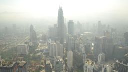 A general view of Kuala Lumpur skyline is seen covered by haze on June 27, 2013. Fires in Indonesia that have blanketed Singapore and Malaysia in thick smog eased on June 26 after heavy rain, boosting hopes of an end to Southeast Asia's worst air pollution crisis for years.