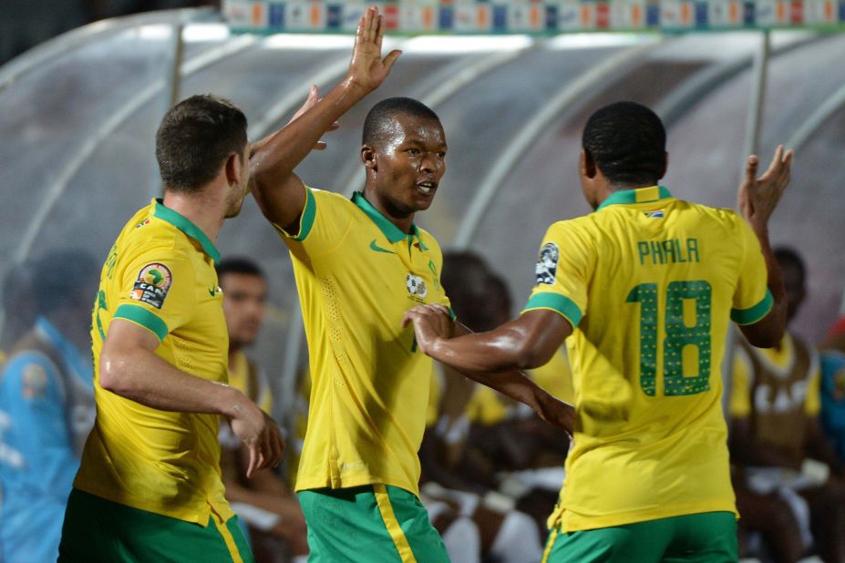 Mandla Masango (center) celebrates with teammates after firing South Africa into the lead of the AFCON Group C fixture with Ghana.