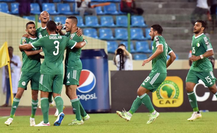 Algeria players celebrate after Riyad Mahrez opened the scoring in their country's Group C AFCON fixture against Senegal.