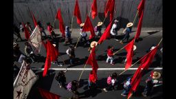 People march during a protest in Mexico City, Mexico, on Monday, January 26, for the 43 students that went missing in September.