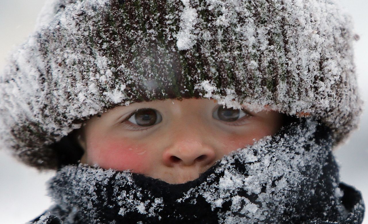 JANUARY 28 - NEW HAMPSHIRE, UNITED STATES: A boy is bundled up as he plays in the snow following a snowstorm in Concord. <a href="http://edition.cnn.com/2015/01/28/us/weather-storm/index.html">Boston saw its biggest snow for any January </a>with more than 24 inches. Worchester, Massachusetts, broke its all-time record with 33.5 inches. Only Lunenburg, Massachusetts, broke the three-foot mark -- with 36 inches -- by early Wednesday, <a href="http://www.hpc.ncep.noaa.gov/discussions/nfdscc2.html" target="_blank" target="_blank">according to the National Weather Service.</a> 