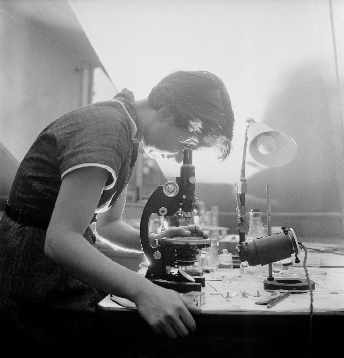 Rosalind Franklin at work in a London laboratory. Her contribution to the understanding of the DNA structure has now been acknowledged, but at the time did not receive full recognition.