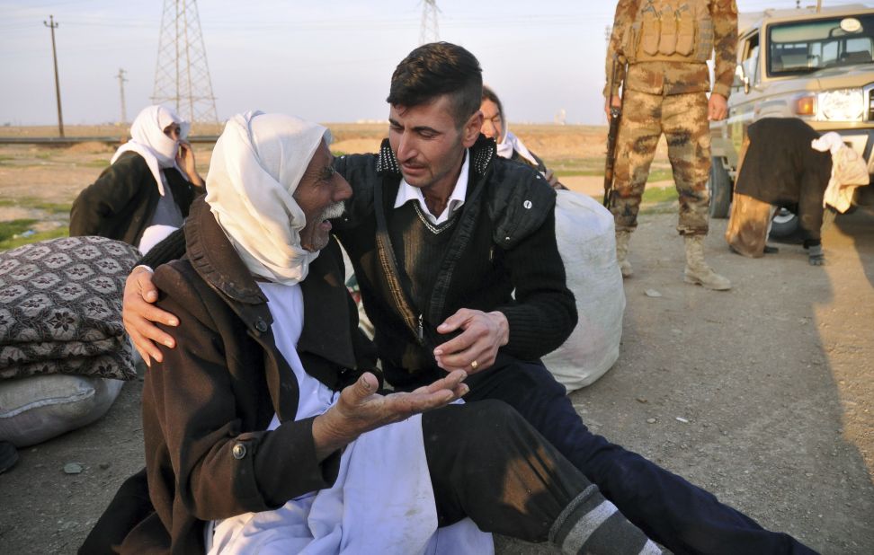 An elderly Yazidi man arrives in Kirkuk after being released by ISIS on Saturday, January 17. The militant group released about 200 Yazidis who were held captive for five months in Iraq. Almost all of the freed prisoners were in poor health and bore signs of abuse and neglect, Kurdish officials said.