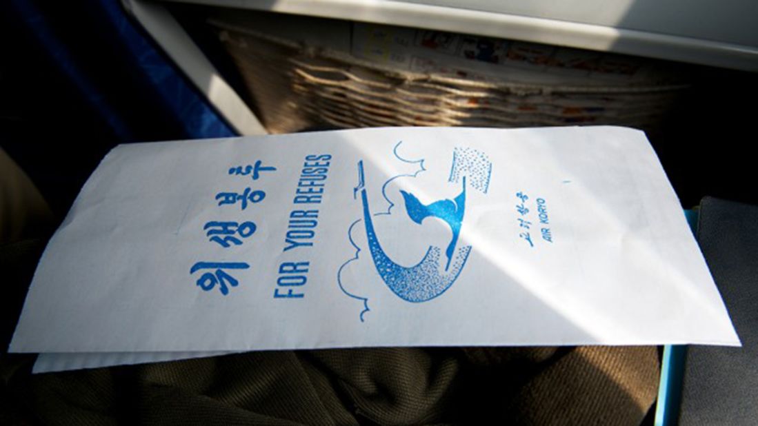 A rare flight on a North Korean airliner makes even this air sickness bag a potential souvenir. 