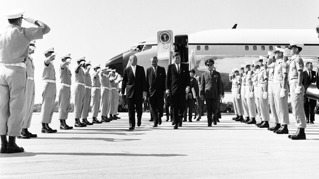From left, astronaut John Glenn, Vice President Lyndon B. Johnson, and President John F. Kennedy arrive at Cape Canaveral Air Force Station in February 1962. Kennedy was the first president to use a customized Boeing VC-137C as Air Force One. The plane was a military version of the Boeing 707. Code-named "SAM 26000," this jet served presidents for more than three decades.