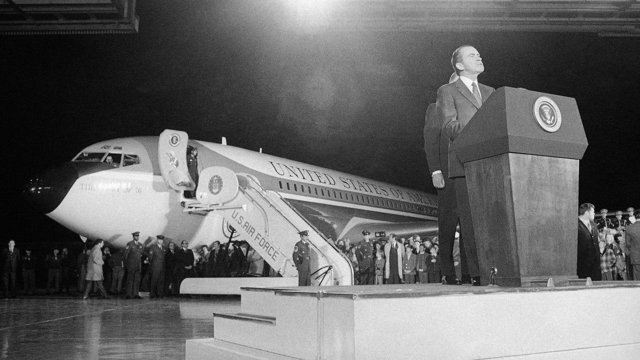 With Air Force One in the background, President Richard Nixon delivers a speech at Andrews Air Force Base near Washington after returning from his historic trip to China in February 1972.