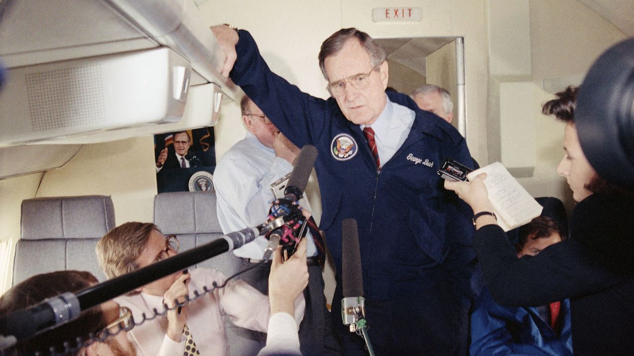 President George H. W. Bush talks with reporters aboard Air Force One in 1990. The Boeing VC-25 -- a military version of the 747-200B -- served as Air Force One for Bush as well as Presidents Bill Clinton, George W. Bush and Barack Obama.