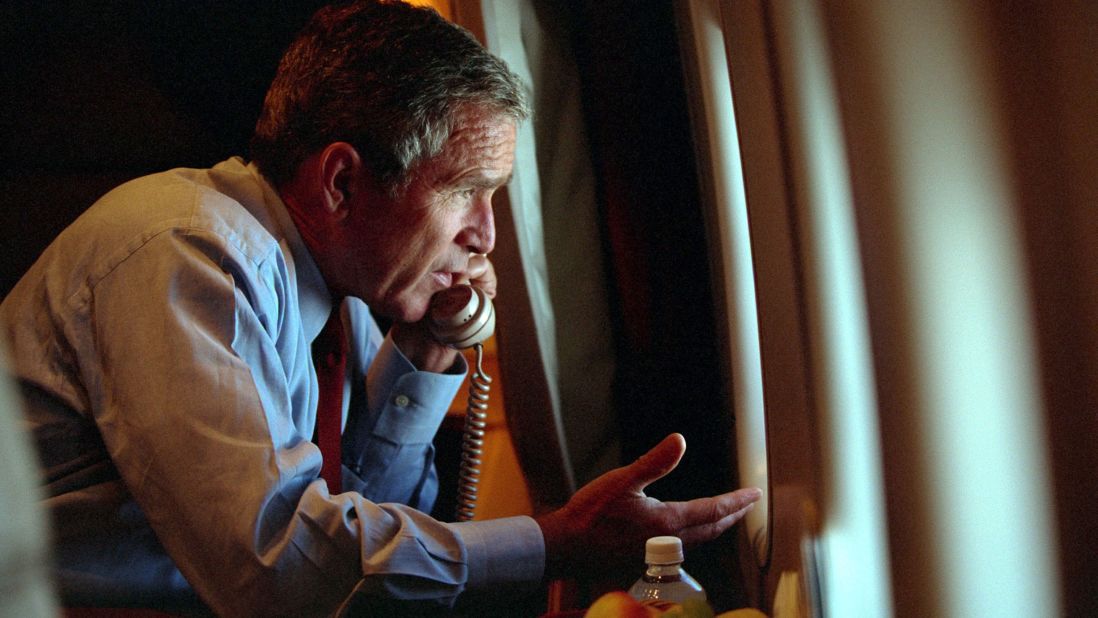 President George W. Bush, aboard Air Force One, speaks with Vice President Dick Cheney by phone on September 11, 2001.