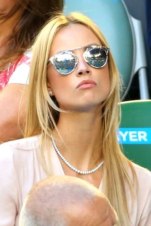 Berdych's fiancee, model Ester Satorova, also took in the match on Rod Laver Arena.