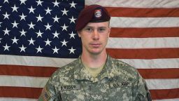 In this undated image provided by the US Army, Sgt. Bowe Bergdahl poses in front of an American flag. (Photo by US Army via Getty Images)