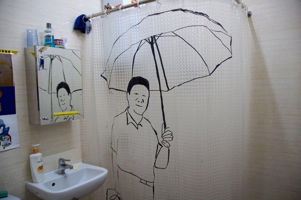 Chinese President Xi Jinping is depicted holding an occupy movement umbrella on the hotel's shower curtain.
