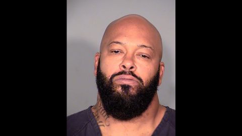 Knight is seen in a police booking photo after he and comedian Micah "Katt" Williams were arrested in October 2014 for allegedly stealing a photographer's camera.
