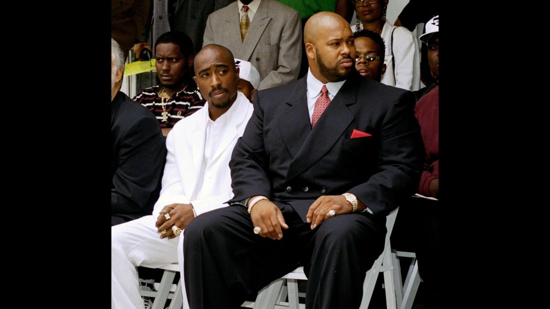 Knight and Shakur, left, attend a voter registration event in Los Angeles in August 1996. Knight was driving the car in which Shakur was a passenger when the rapper was shot to death in Las Vegas.