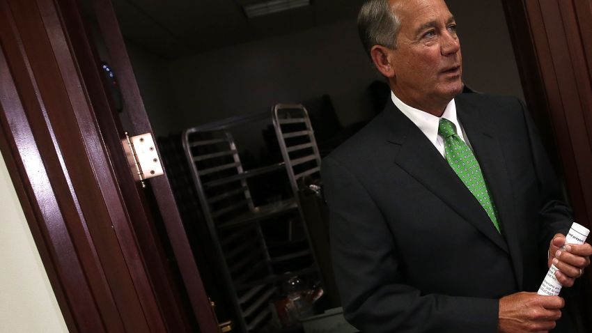 WASHINGTON, DC - JANUARY 07: Speaker of the House John Boehner (R-OH) arrives to take questions before a press conference at the U.S. Capitol January 7, 2015 in Washington, DC. Boehner discussed priorities of the new U.S. Congress, and the recent attack in Paris during his remarks.