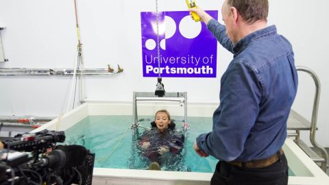 MainSail presenter, Shirley Robertson, learns how to cope with cold water shock at the plunge at the University of Portsmouth's extreme weather lab.