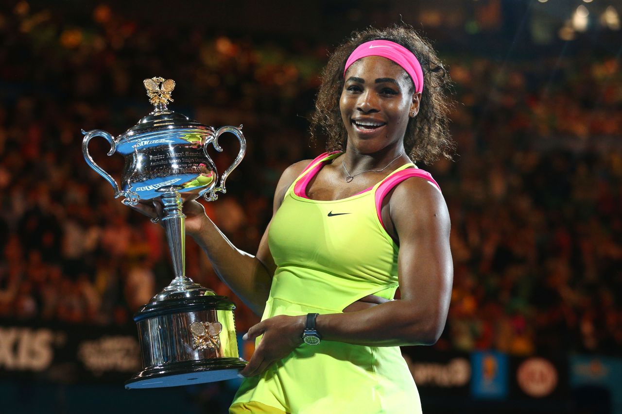 Serena Williams poses with the Daphne Akhurst trophy after beating Maria Sharapova in the Australian Open final. 