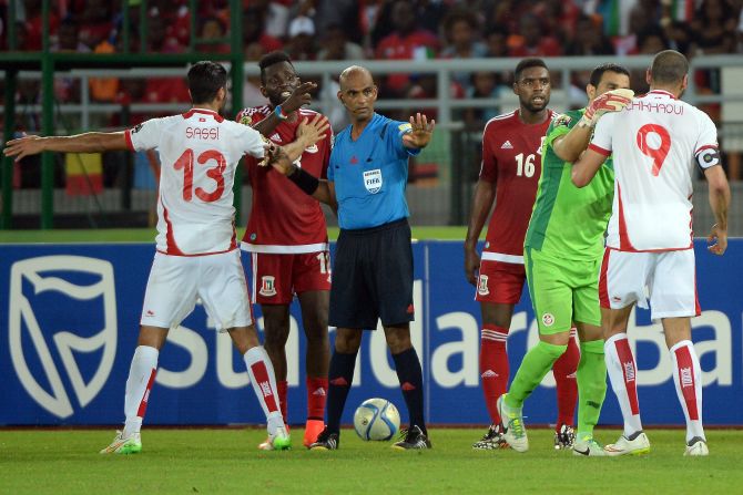 The referee took center stage in a bad-tempered AFCON quarterfinal between Tunisia and Equatorial Guinea - won 2-1 by the hosts.