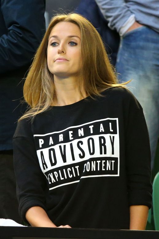 But maybe this will cheer Murray up. It was the shirt worn by his fiancee pre match. She was in hot water Thursday when she was caught swearing on TV. 