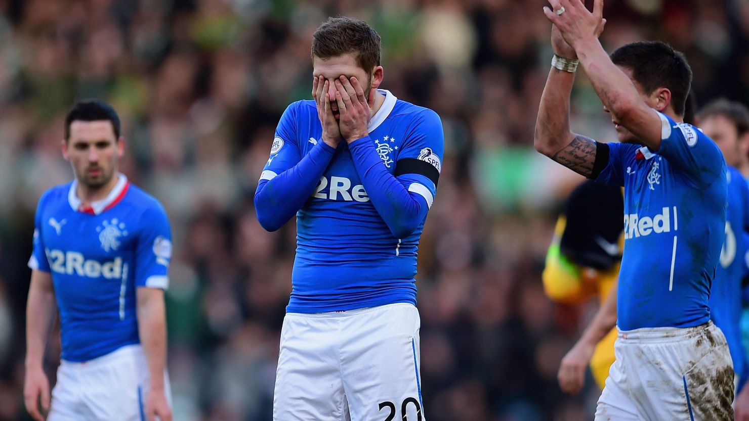 Dejected Rangers players troop off Hampden after losing 2-0 to Celtic in the Scottish League Cup semifinal. 