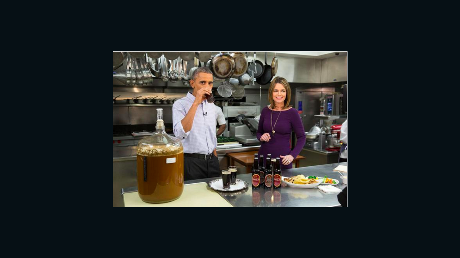 President Barack Obama swigs some beer before the Super Bowl with NBC's Savannah Guthrie.