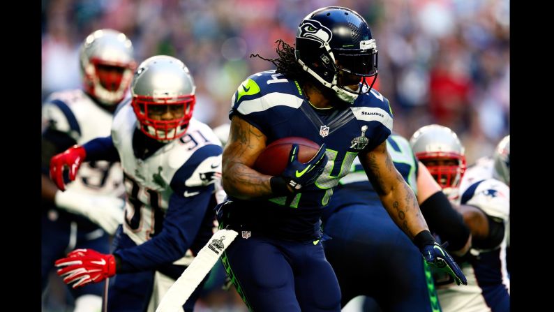 Lynch runs the ball in the first quarter.