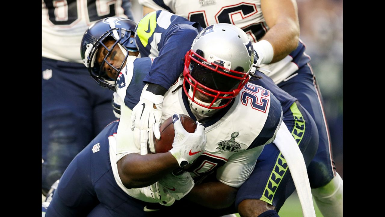 Blount carries the ball in the first half.