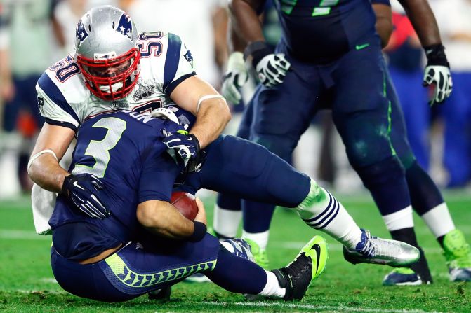 Patriots defensive end Rob Ninkovich sacks Wilson during the second half.