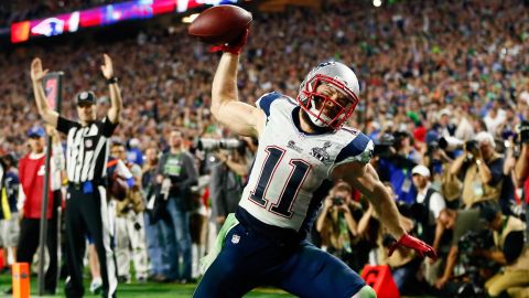 New England wide receiver Julian Edelman spikes the ball after his fourth-quarter touchdown catch gave the Patriots a lead they wouldn't relinquish.
