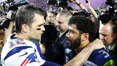 Brady is congratulated by Seahawks quarterback Russell Wilson. Wilson and the Seahawks won the Super Bowl last year.