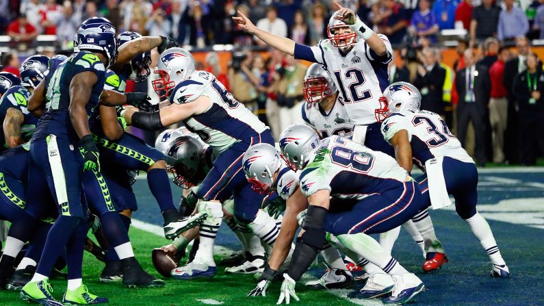 Brady signals late in the game as the Patriots run out the clock.