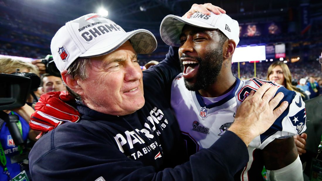 Patriots head coach Bill Belichick embraces cornerback Darrelle Revis after the game. This is the fourth Super Bowl that the Patriots have won with Belichick as head coach and Tom Brady as quarterback.