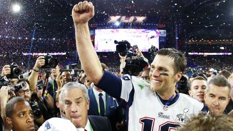 Caption:GLENDALE, AZ - FEBRUARY 01: Tom Brady #12 of the New England Patriots celebrates after defeating the Seattle Seahawks 28-24 during Super Bowl XLIX at University of Phoenix Stadium on February 1, 2015 in Glendale, Arizona. (Photo by Tom Pennington/Getty Images)