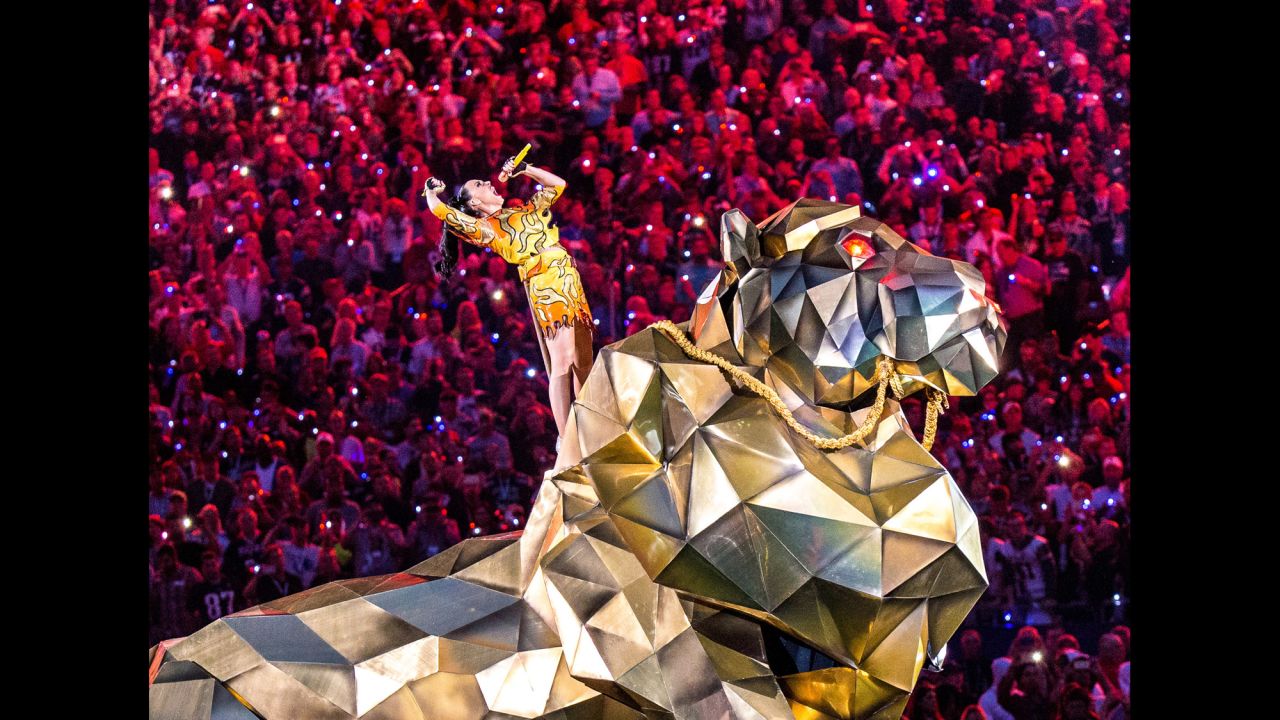 Perry started the show by singing "Roar" and riding in on a massive mechanical tiger. Or was it a lion?