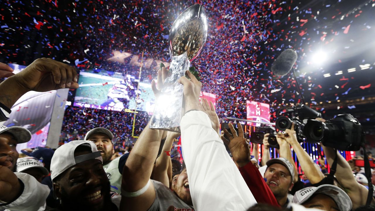 The New England Patriots celebrate with the Vince Lombardi Trophy after winning Super Bowl XLIX on Sunday, February 1. The Patriots defeated the Seattle Seahawks 28-24 in Glendale, Arizona.
