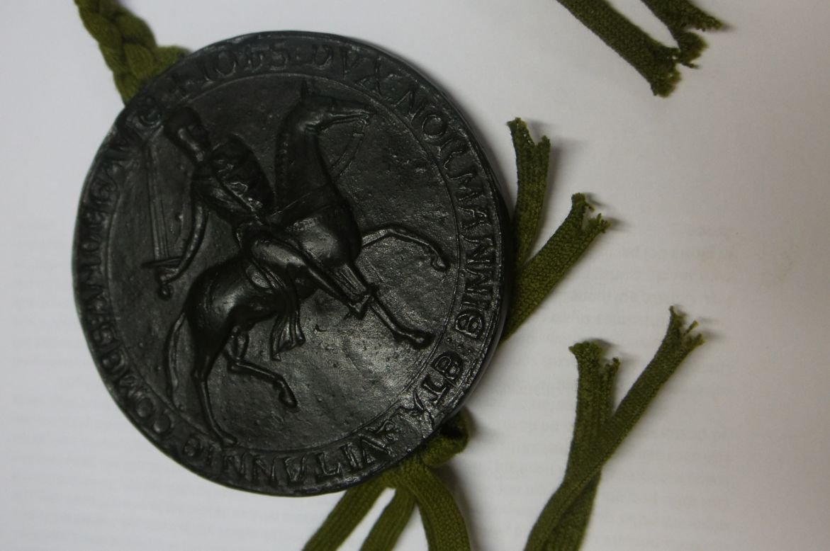 The Magna Carta was not signed by King John -- instead his official seal was attached to it. This replica shows what it would have looked like. Only one of the four surviving copies, one of the pair held in the British Library, still has the remnants of its seal.