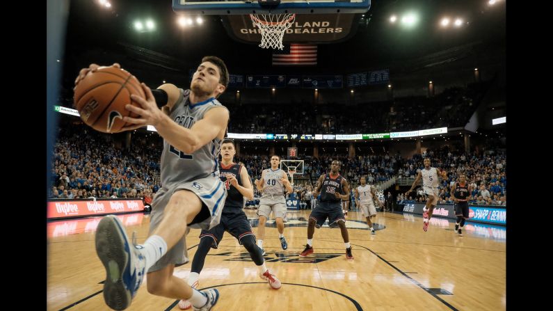 Creighton's Avery Dingman chases down a loose ball during a college basketball game played Wednesday, January 28, in Omaha, Nebraska. Creighton defeated St. John's 77-74 for its first Big East win of the season.