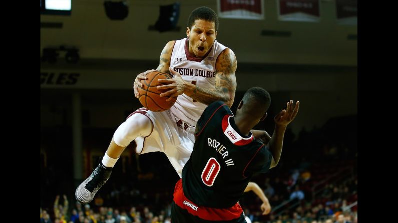 Boston College's Dimitri Batten grabs a loose ball in front of Louisville's Terry Rozier III during a game in Chestnut Hill, Massachusetts, on Wednesday, January 28. Louisville won 81-72 to improve its record to 17-3.