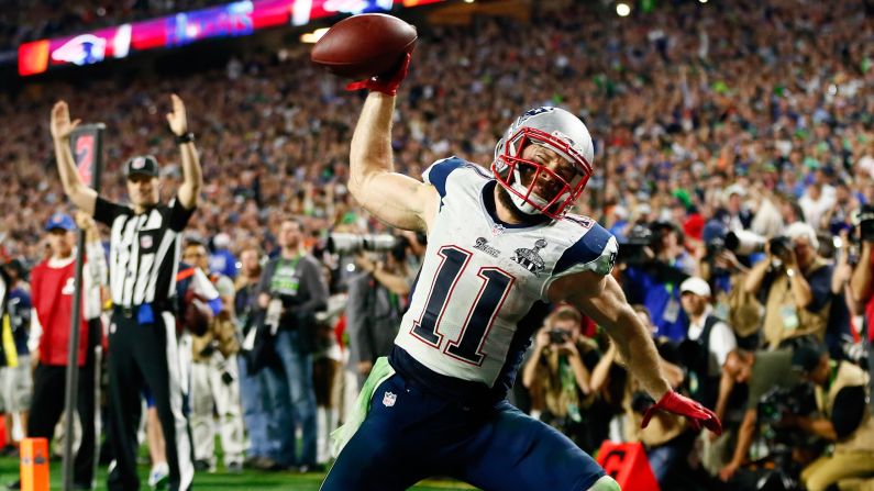 New England wide receiver Julian Edelman spikes the ball after his fourth-quarter touchdown catch in Super Bowl XLIX gave the Patriots a lead they wouldn't relinquish.