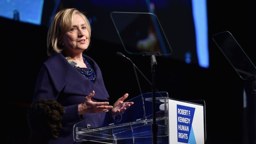 Caption:NEW YORK, NY - DECEMBER 16: Honoree Hillary Rodham Clinton speaks onstage at the RFK Ripple Of Hope Gala at Hilton Hotel Midtown on December 16, 2014 in New York City. (Photo by Mike Coppola/Getty Images for RFK Ripple Of Hope)