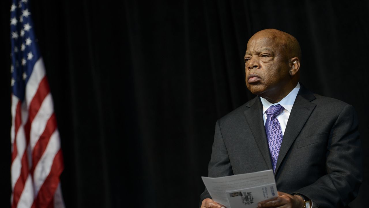 Caption:WASHINGTON, DC - AUGUST 23: John Lewis attends the U.S. Postal Service Unveiling of the 1963 March On Washington Stamp on August 23, 2013 in Washington, United States. (Photo by Riccardo S. Savi/Getty Images for U.S. Postal Service)