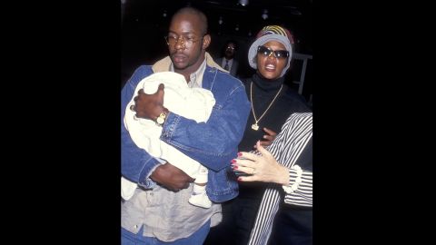 Bobby Brown, Houston and a 3-month-old Bobbi Kristina arrive at New York's Kennedy Airport in 1993.
